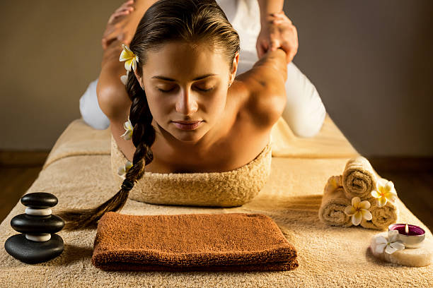 the beautiful girl has massage. stretching.